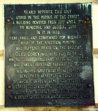Marker for the Salem Courthouse of 1692 on the wall of the Masonic Temple on Washington Street