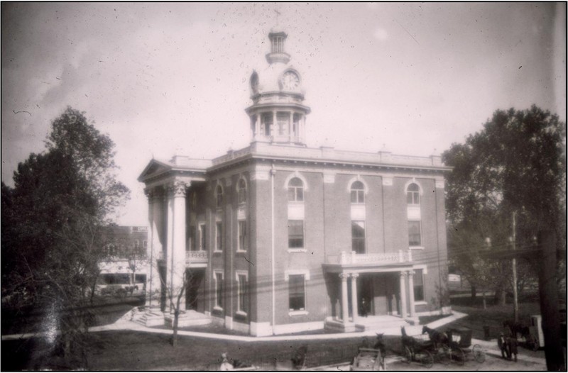 Rutherford County Courthouse in the days of the horse and buggy.