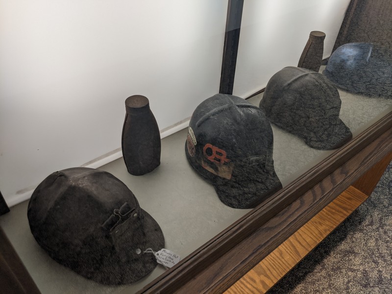 Helmet, Cap, Musical instrument, Artifact