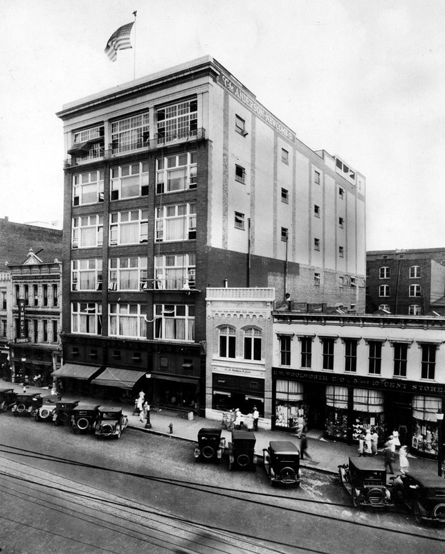 The building after it was made into Anderson-Newcomb Company, and after three additional stories were added to the building.