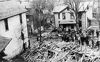 Corner of Tenth and Avery Street. View of the wreckage caused by tanks.