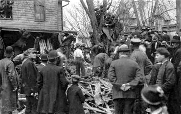 People searching for dead bodies in the wreckage on Tenth and Avery