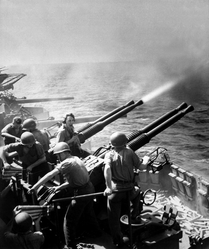 Hornet's antiaircraft batteries helped protect against the deadly kamikaze attacks of the war's latter battles. Here, a quad mount Bofors 40mm gun goes into action.