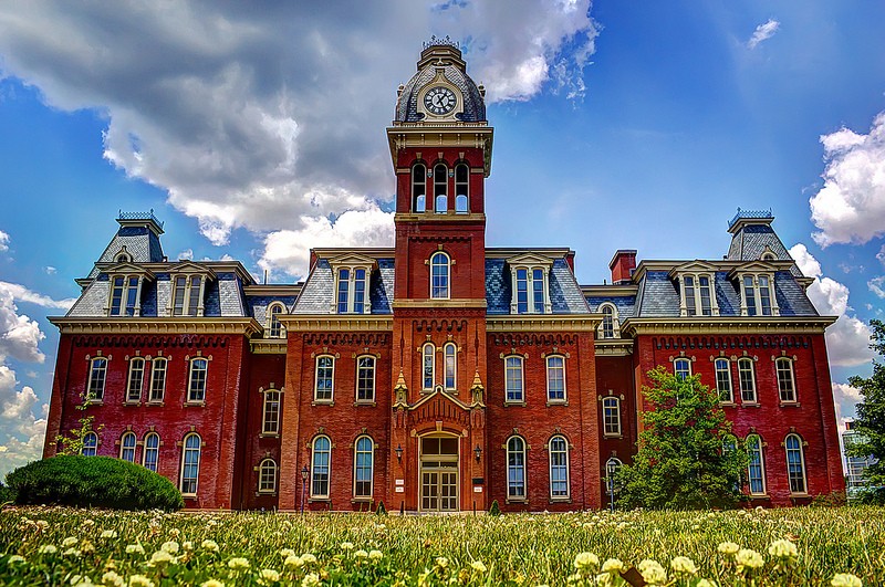 Woodburn's red brick, Mansard roof, and bell tower are beautiful examples of the Second Empire architectural style.