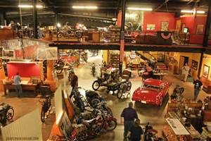 Second floor view of the many bikes and iconic cars in American history