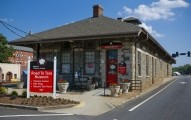 Walking into the 1867 Historic Train Depot in Jonesboro, which houses the Road to Tara Museum, begins your journey.