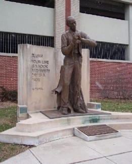 This statue of Elijah Pierce was created by artist Steven Weitzman and dedicated in 2000. 