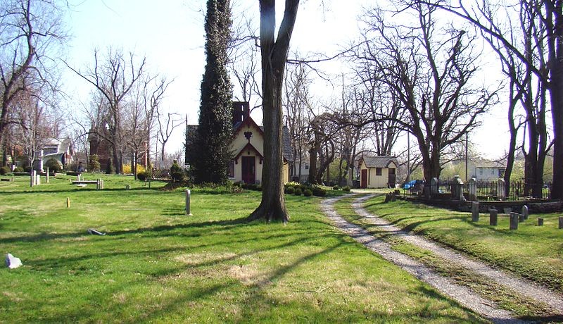 Front facing photo through the trees of the Chapel House