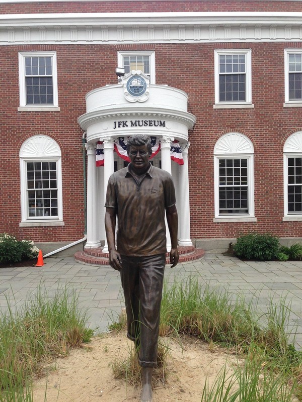 Closer image of statue of John F. Kennedy outside of the museum. 