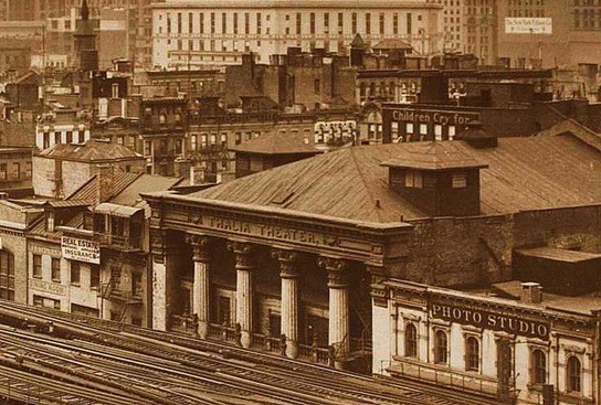 Fay's Bowery Theatre in 1928, one year before the final fire; note the el tracks in front of the building (image from Manhattan Unlocked)