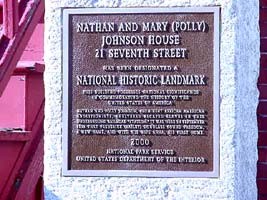 Plaque on the building, indicating that the property is a National Historic Landmark