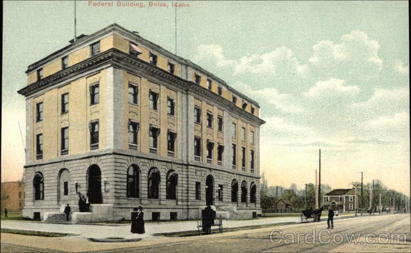Early postcard depicting the Federal Building standing alone in the landscape
