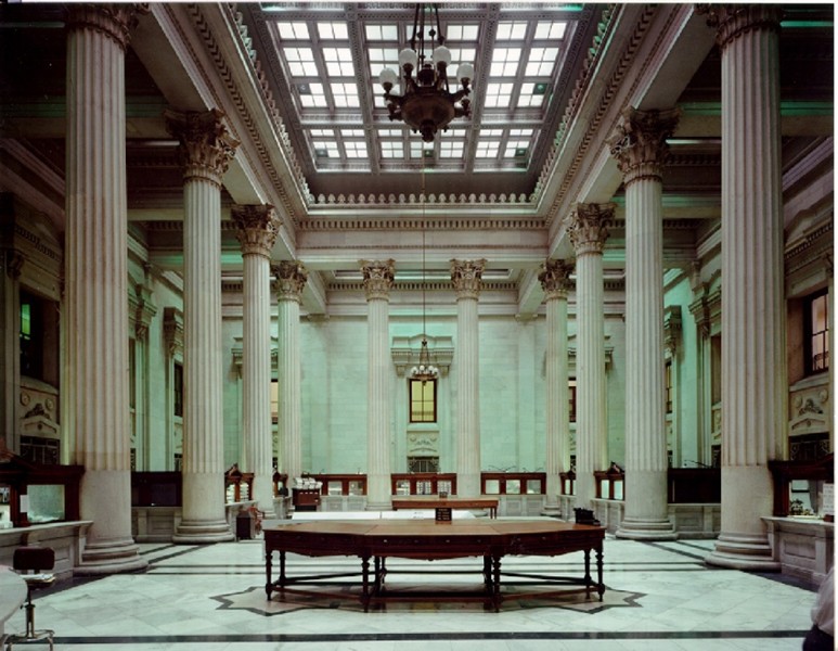 The grand Marble Hall in the center of the building is one of the finest Greek Revival interiors in the United States.