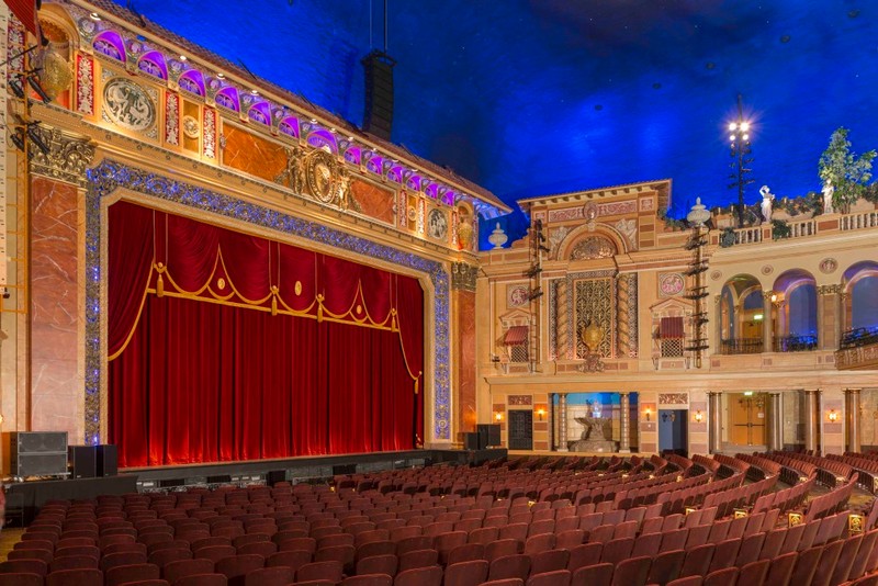 The restored interior demonstrates the grandeur of this historic atmospheric theater. 