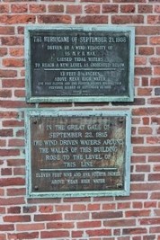 Hurricane of 1938 historical marker is located on the Market House near the Providence River Walk