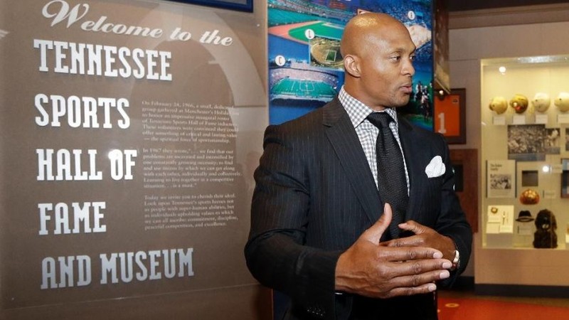 Running back Eddie George stands at the entrance to the Hall of Fame.