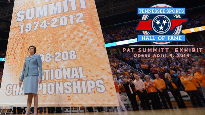 Pat Summit stands in front of the exhibit in her honor.