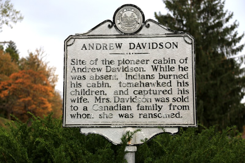 Marker on the site of the Davidson Cabin. "While he was absent, Indians burned his cabin, tomahawked his children, and captured his wife. Mrs. Davidson was sold to a Canadian family from whom she was ransomed." 