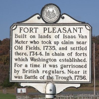 Inscription. Built on lands of Issac Van Meter who took up claim near Old Fields, 1735, and settled there, 1744, in chain of forts which Washington established. For a time it was garrisoned by British regulars. Near it was Battle of the Trough, 1756.