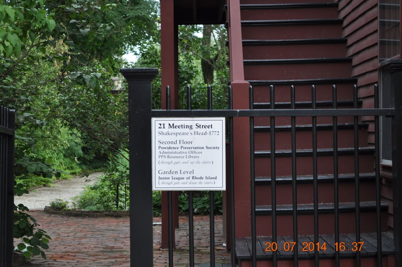 Shakespeare's head gate with sign (image from Historic Markers Database)