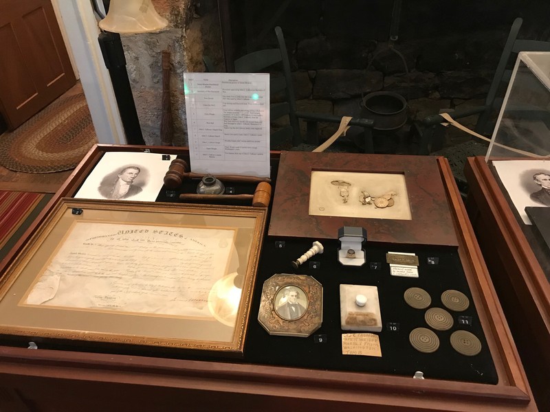 Display Case containing small personal items pertaining to the people of Fort Hill