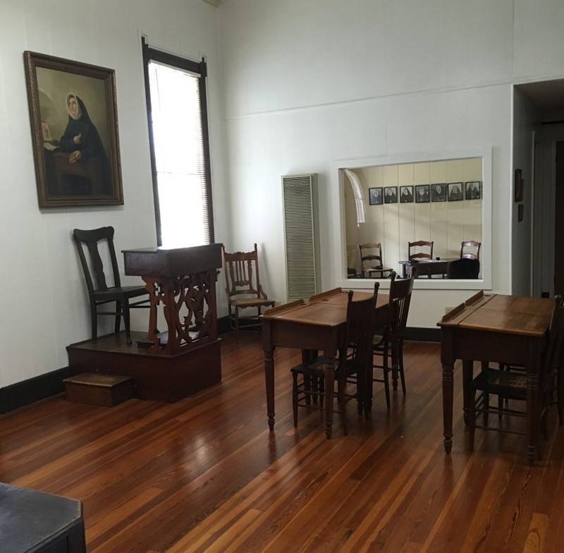 As most students were boarders, they came together in the evenings to study. They would have been presided over by one of the Religious seated on an elevated platform.