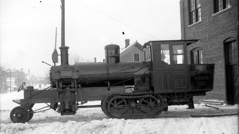 Phoenix log hauler outside plant with front wheels on track (ca. 1903-1920)