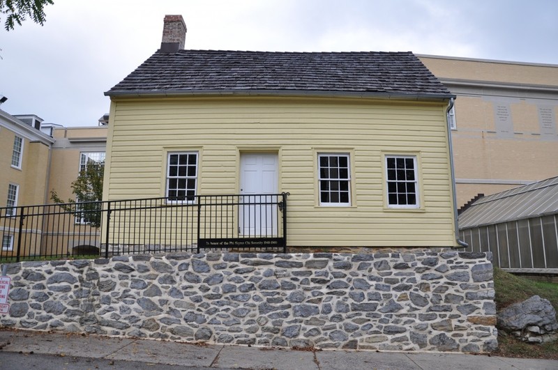 Beneath this yellow wood siding are the logs used to build this cabin in the late 1700s. 