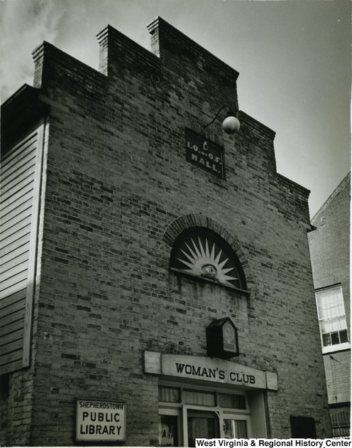 The building, circa 1930-1940, in use as the Woman's Club library. Photo courtesy of the West Virginia and Regional History Center, WVU Libraries.