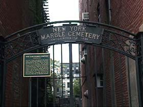 Entrance to the cemetery is via iron gates 