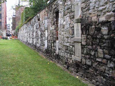 The walls of the cemetery feature marble plaques that mark each vault (http://evpcnyc.org/)