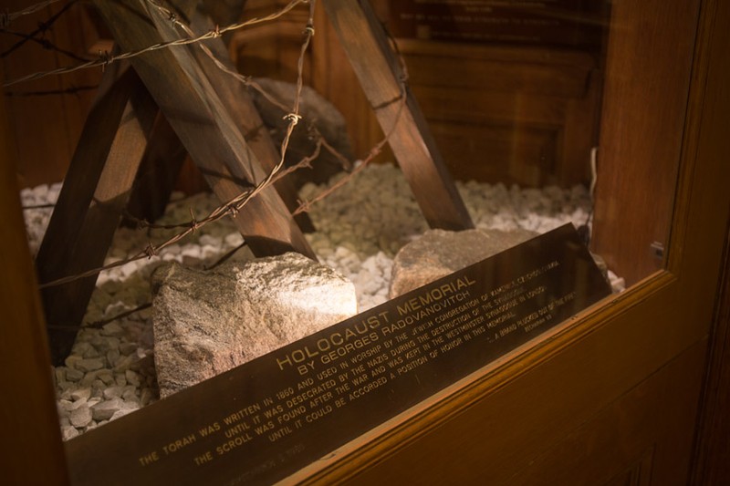 Holocaust Torah display (image from Sideways NYC)