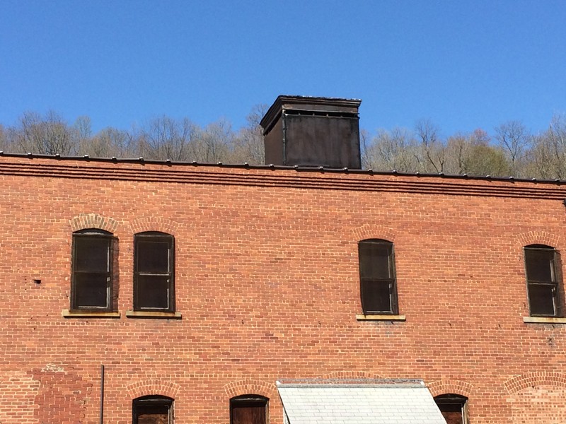 A detail of the guard tower on the roof of the company store. Armed guards would be posted inside.
