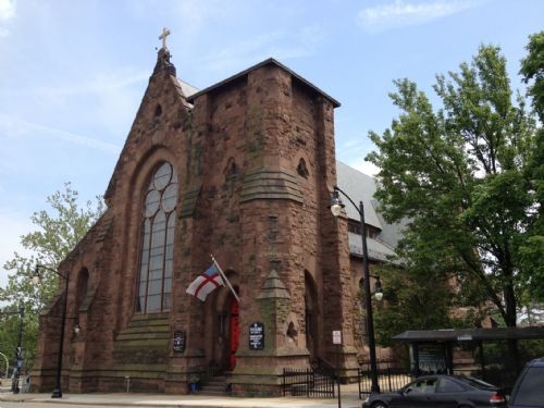 The church was designed by architect Edward Tuckerman Potter and is distinguished by its unique flat tower and large stained glass facade. 