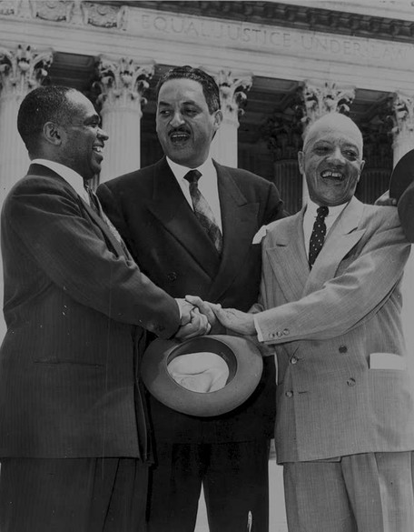 George E.C. Hayes, Thurgood Marshall, and James Nabrit, congratulating each other following Supreme Court decision declaring segregation unconstitutional (1954). Image Courtesy of the Library of Conress.