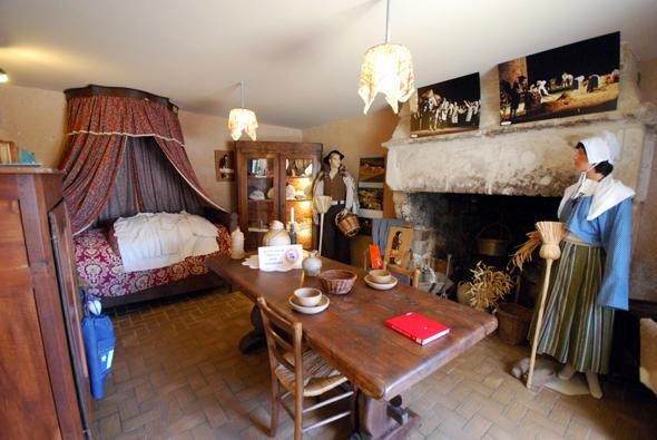 Display of a typical Acadian room within a typical Acadian home.