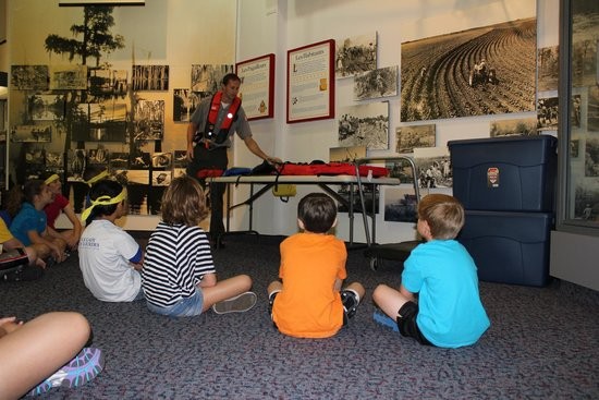 Children enjoy an educational program.