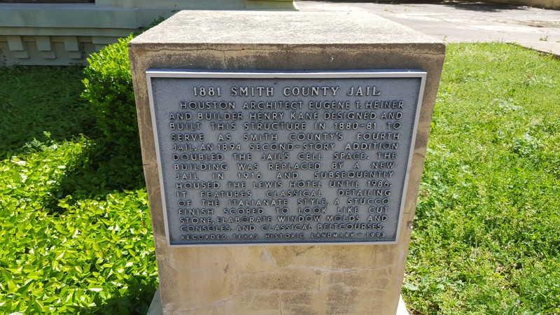 This historical marker provides brief description of building's history.