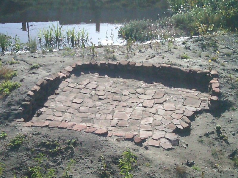 Part of El Polín Spring's Colonial-era archaeological site, an excavated water storage basin from an early 19th century adobe home (image from Golden Gate Audubon Society)