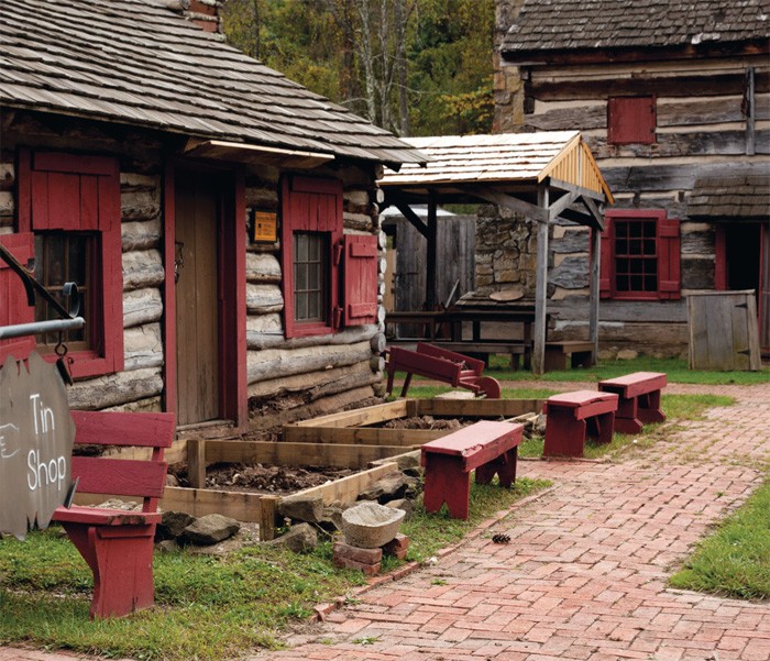 Closer image of the log structures located at Fort New Salem