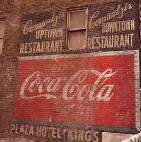 Coca-Cola mural before restoration.