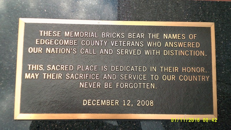 The plaque at the edge of the Memorial Bricks.