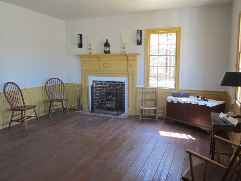 The original parlor of the house has been restored with museum era furnishings. The mantle, the windows and the wainscoting were all constructed by students to replace the missing items. 