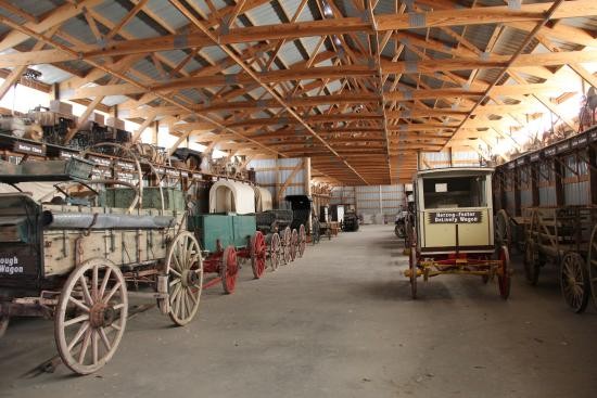 Wagons are featured in this building along with cars and other items