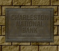 This plaque commemorates construction of the first Charleston National Bank  in 1884.