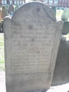 Gravestone of Captain Daniel Malcom, allegedly used for target practice by British soldiers (image from Historic Markers Database)