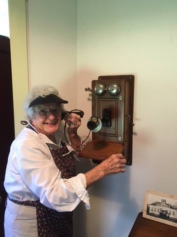 Fran Peters, docent, on a call in the Old Stevensville Post Office