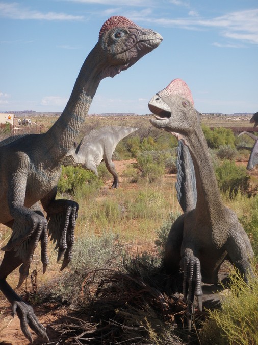 Two of the life-size dinosaurs on display on the trail