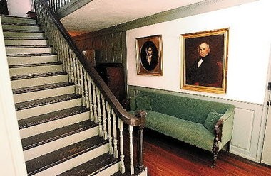 The house's entryway and central staircase.
