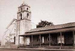 San Buenaventura Mission in 1877, in a photograph by Carleton Watkins, a famed photographer of the American West--particularly of California.